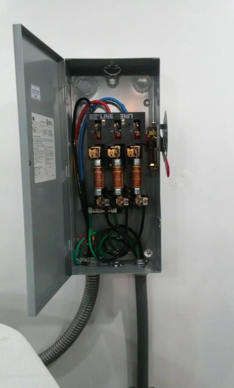 Three-phase disconnect switch installed for Smoke Detector Installation in Cairo